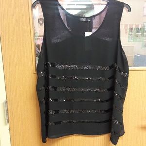 Woman's sheer black sequin blouse